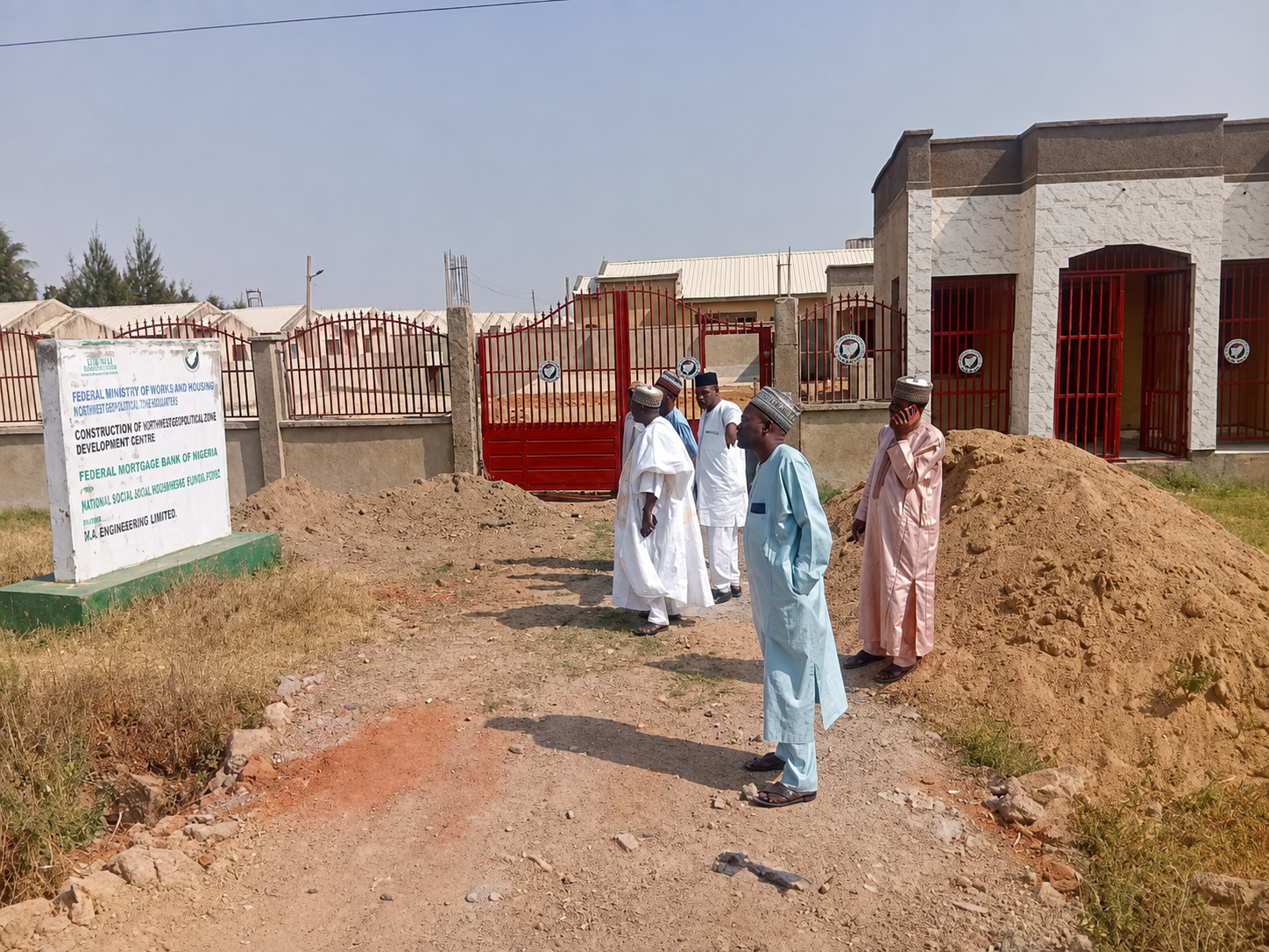 MHWUN officials inspecting the housing development