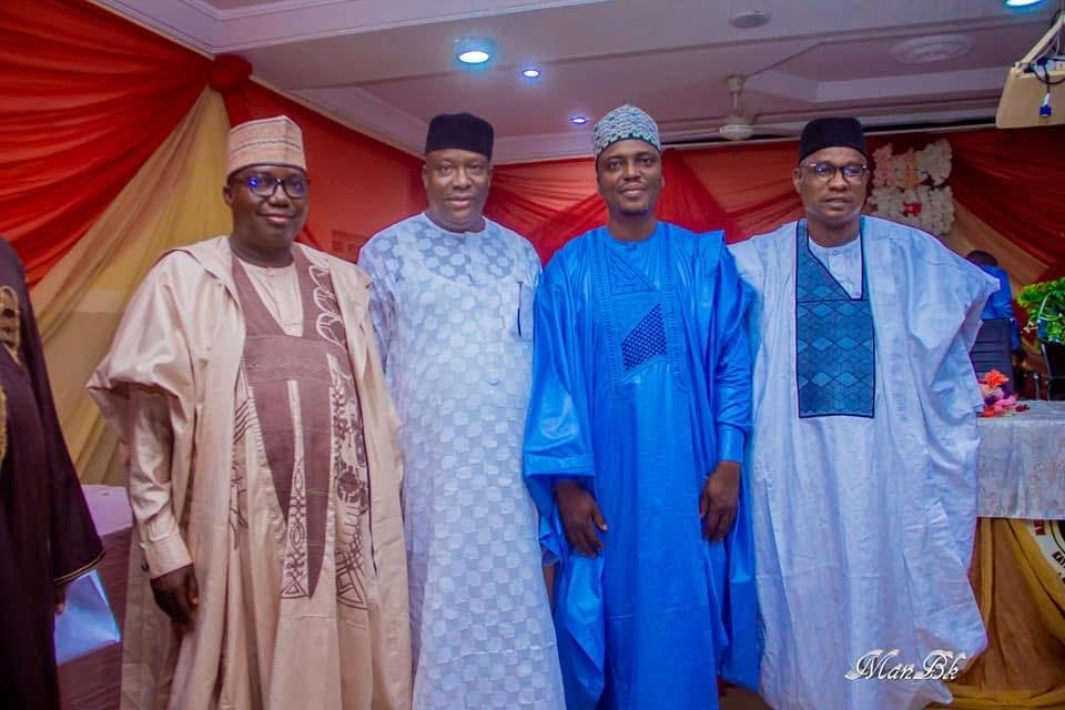 MHWUN family members standing together at a celebration