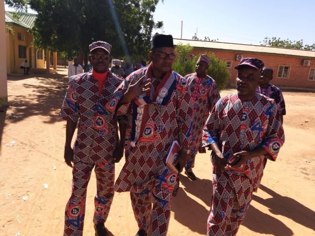 MHWUN family members outdoors in matching attire