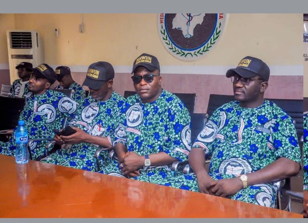 MHWUN family members seated during a meeting